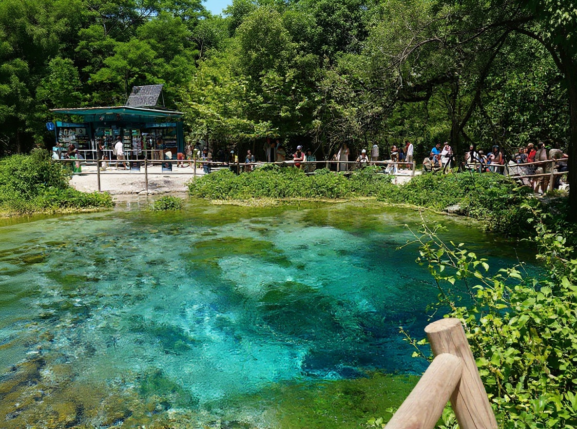 The Blue Eye spring — 10°C year-round and genuinely that colour